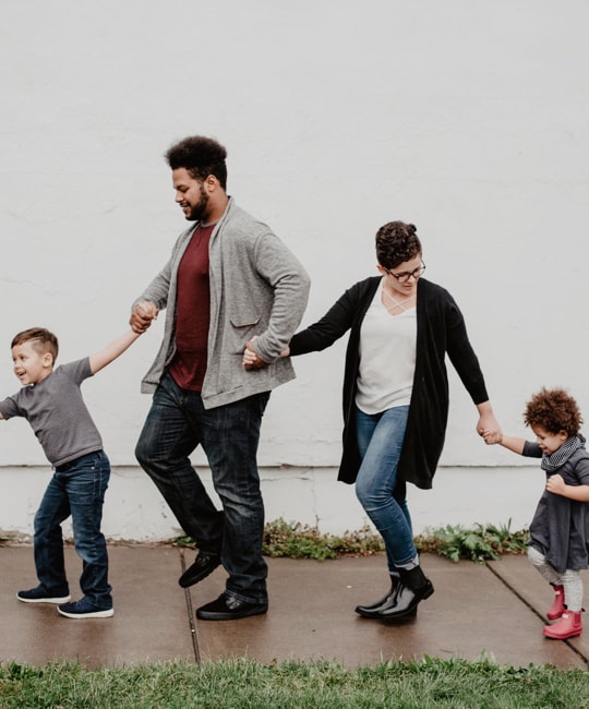 four-people-holding-hands